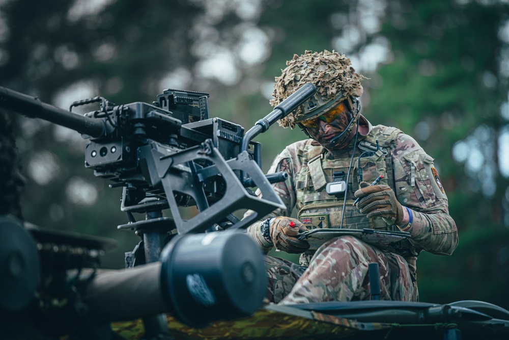 British Soldiers conduct recon exercise during eFP NATO BG-P