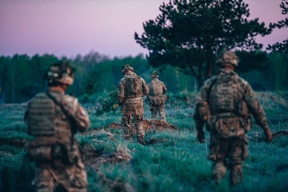 British Soldiers conduct recon exercise during eFP NATO BG-P