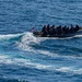 USS Halsey (DDG 97) Sailors man a rigid-hulled inflatable boat during a Visit, Board, Search and Seizure training evolution
