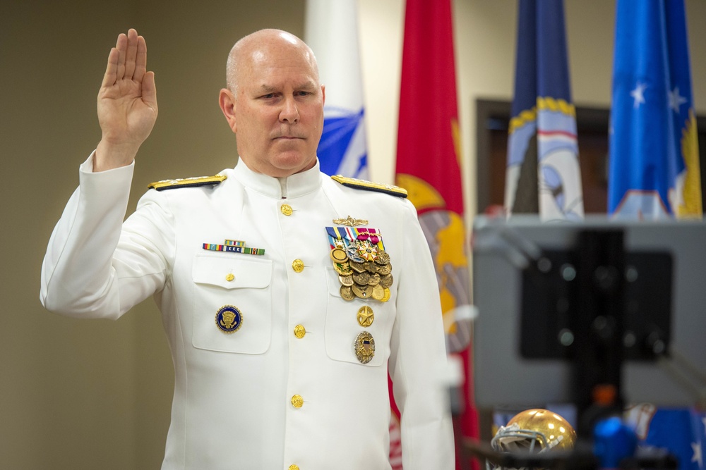 Christopher W. Grady, commander, U.S. Fleet Forces Command, commissions the University of Notre Dame ROTC class of 2020.