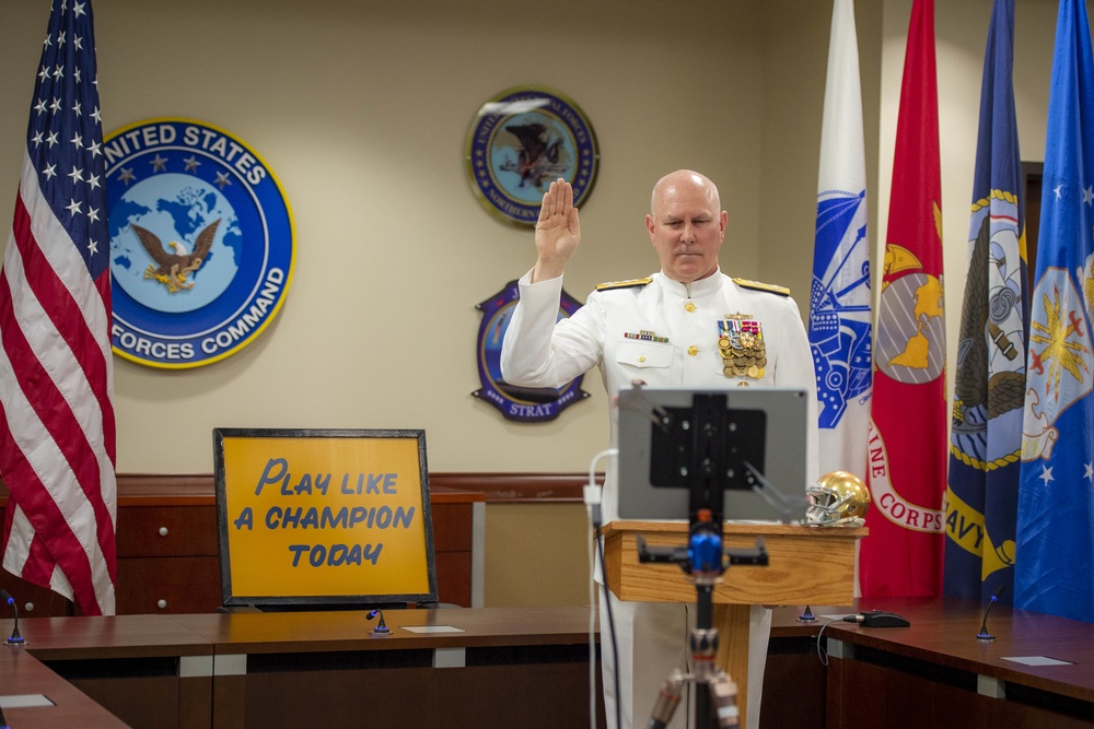 Christopher W. Grady, commander, U.S. Fleet Forces Command, commissions the University of Notre Dame ROTC class of 2020.