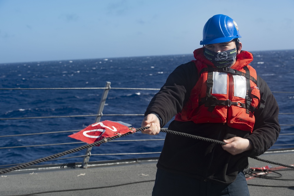 USS Ralph Johnson conducts a replenishment-at-sea