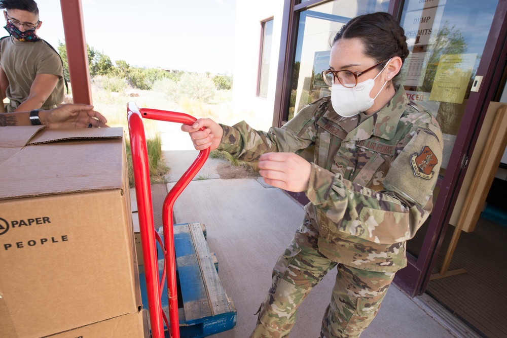 Members from the 150th Mission Support Group work to complete another food delivery mission in Santa Fe, N.M.
