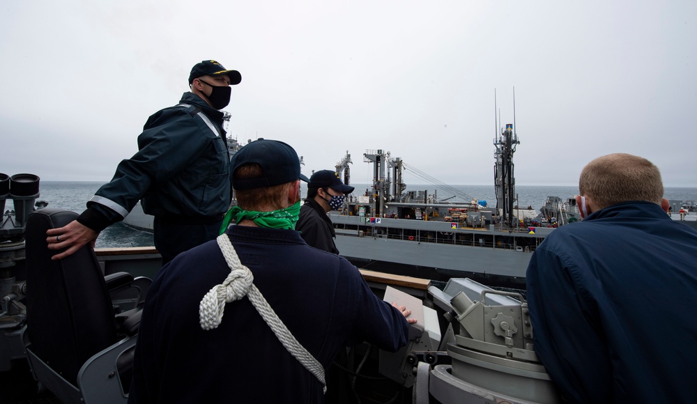 Sterett and Henry J. Kaiser participate in a replenishment-at-sea