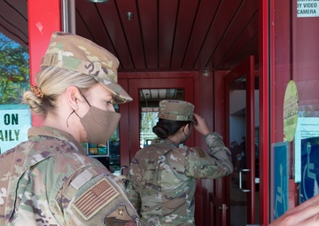 Airmen in the New Mexico National Guard patrol an alternate care site in Shiprock, N.M. 