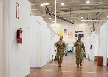 Airmen in the New Mexico National Guard patrol an alternate care site in Shiprock, N.M. 