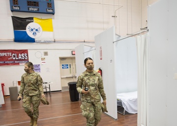 Airmen in the New Mexico National Guard patrol an alternate care site in Shiprock, N.M. 