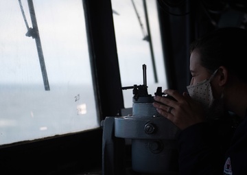 USS Princeton Sailor stands watch