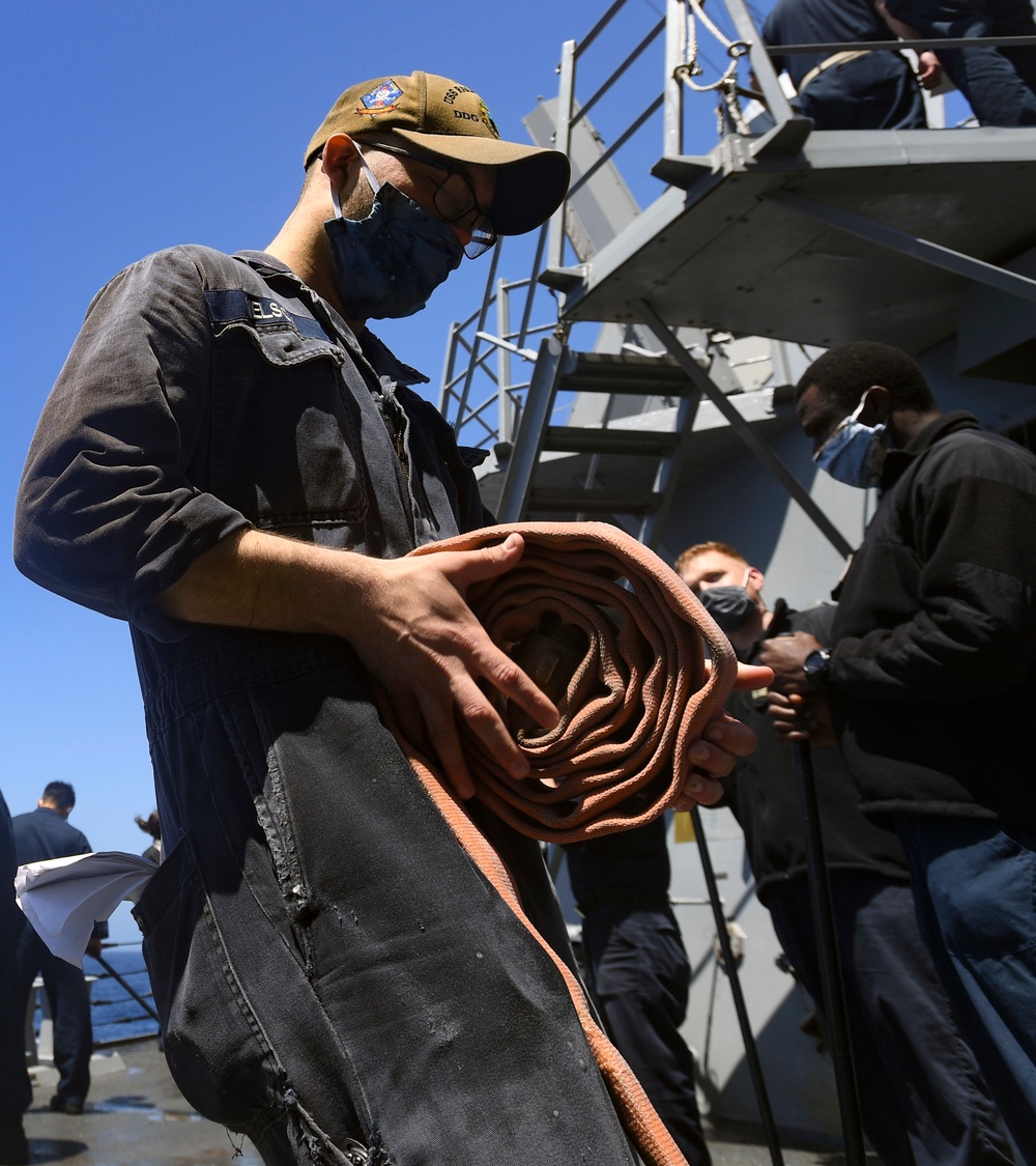 USS Ralph Johnson Conducts Fresh Water Wash Down
