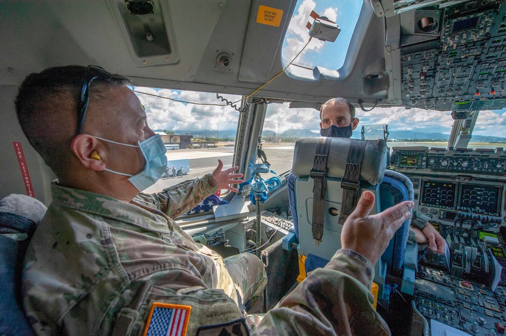 Team Hickam conducts Hawaii flyover honoring those who 'flatten the curve'