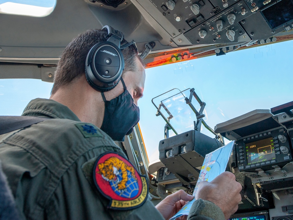 Team Hickam conducts Hawaii flyover honoring those who 'flatten the curve'