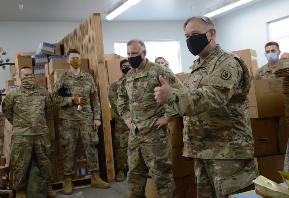 U.S. Congressman Rep. Rick Larsen visits Guardsmen at Sedro-Woolley Food Bank.