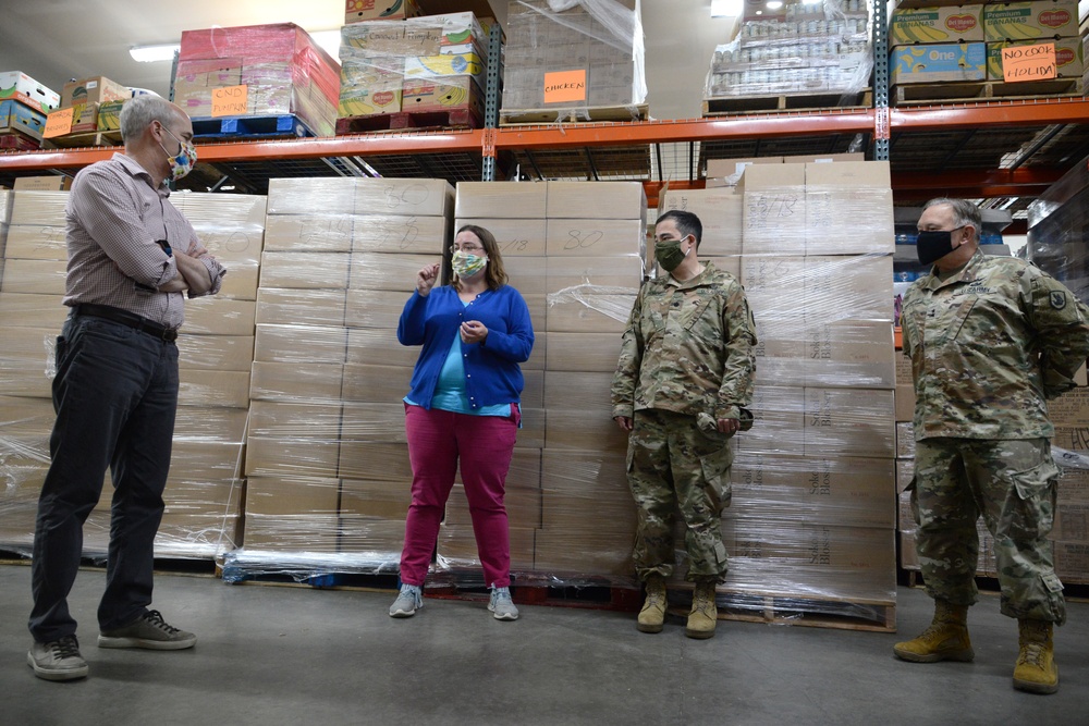 U.S. Congressman Rep. Rick Larsen visits Guardsmen at Sedro-Woolley Food Bank.