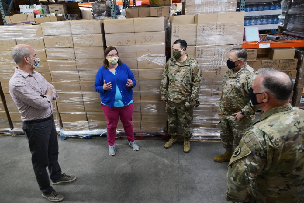 U.S. Congressman Rep. Rick Larsen visits Guardsmen at Sedro-Woolley Food Bank.