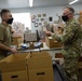 U.S. Congressman Rep. Rick Larsen visits Guardsmen at Sedro-Woolley Food Bank.