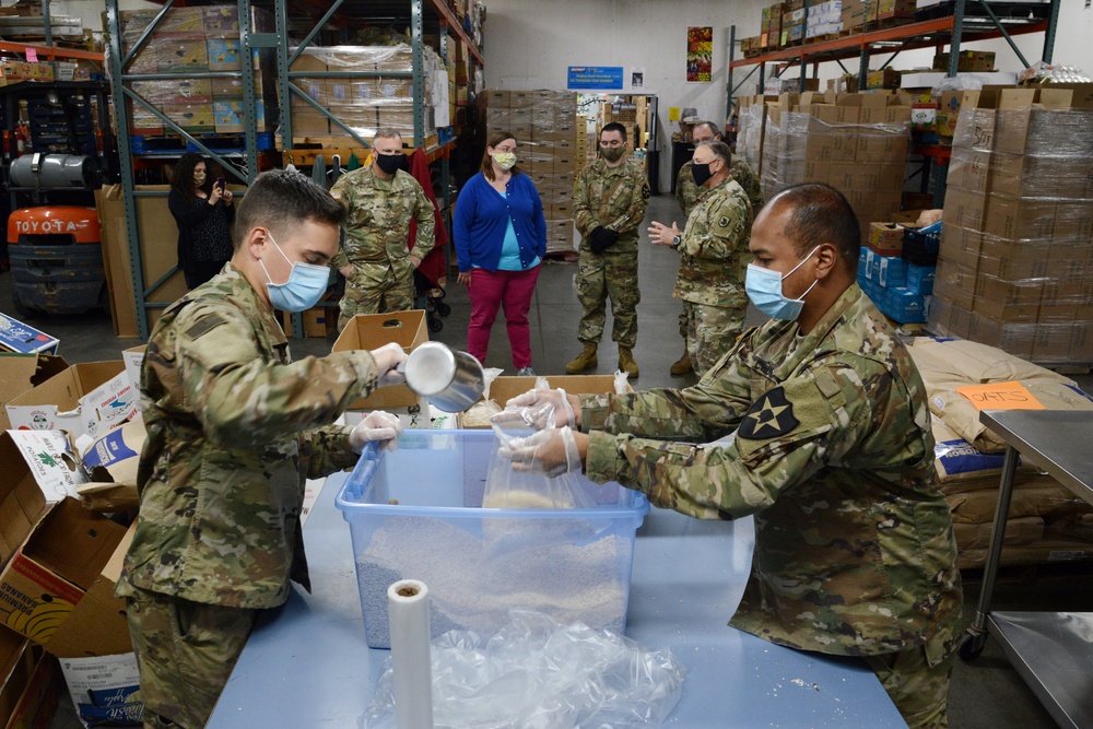 U.S. Congressman Rep. Rick Larsen visits Guardsmen at Sedro-Woolley Food Bank.