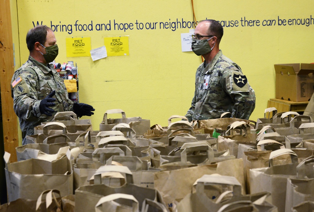 Washington National Guardsmen work at local food banks