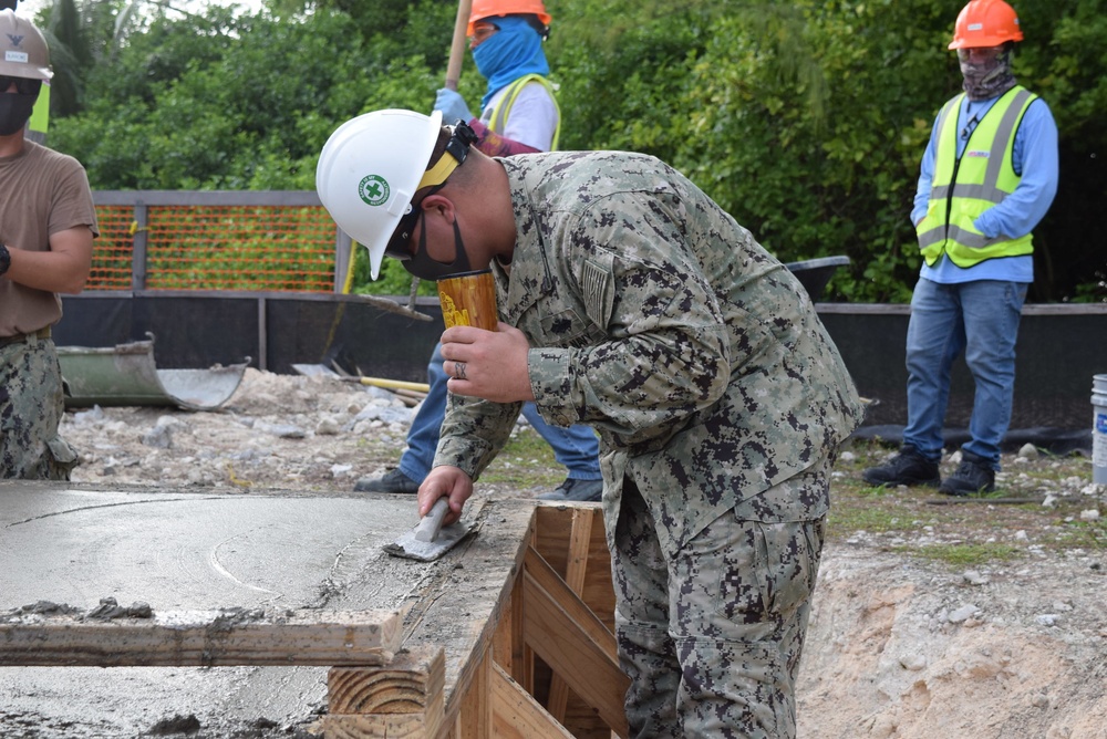 U.S. Navy Seabees from NMCB 5’s Detail Diego Garcia build Tension Fabric Structures to support the U.S. Air Force