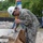 U.S. Navy Seabees from NMCB 5’s Detail Diego Garcia build Tension Fabric Structures to support the U.S. Air Force