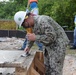 U.S. Navy Seabees from NMCB 5’s Detail Diego Garcia build Tension Fabric Structures to support the U.S. Air Force