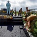 U.S. Navy Seabees with NMCB-5 place asphalt for Marine Air Control Squadron 4