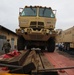 1ID FWD soldiers load vehicles for transit to Fort Riley