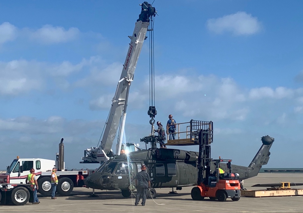 Loading UH-60 for shipment
