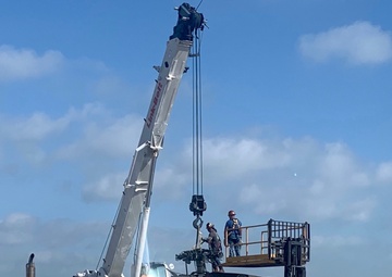 Loading UH-60 for shipment
