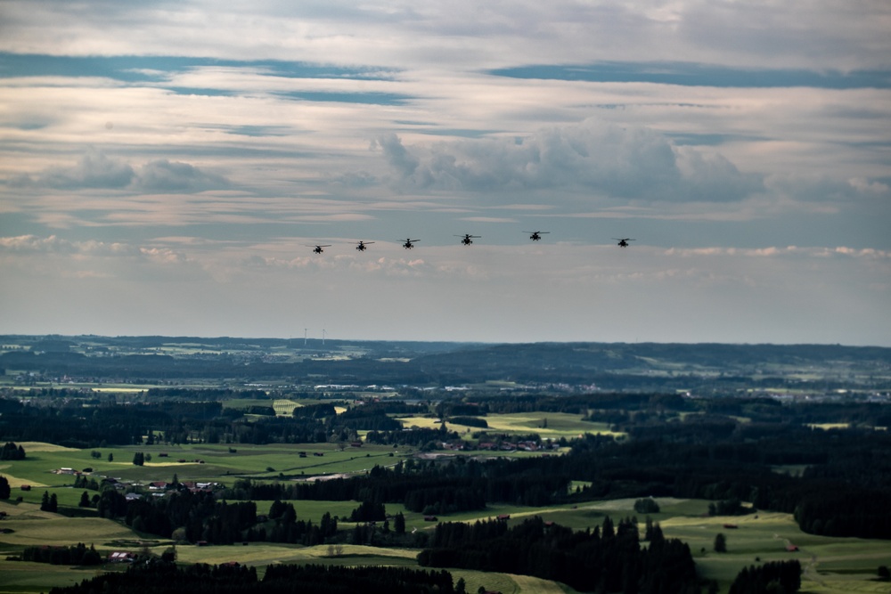 A full Apache attack helicopter battalion trains over Bavaria