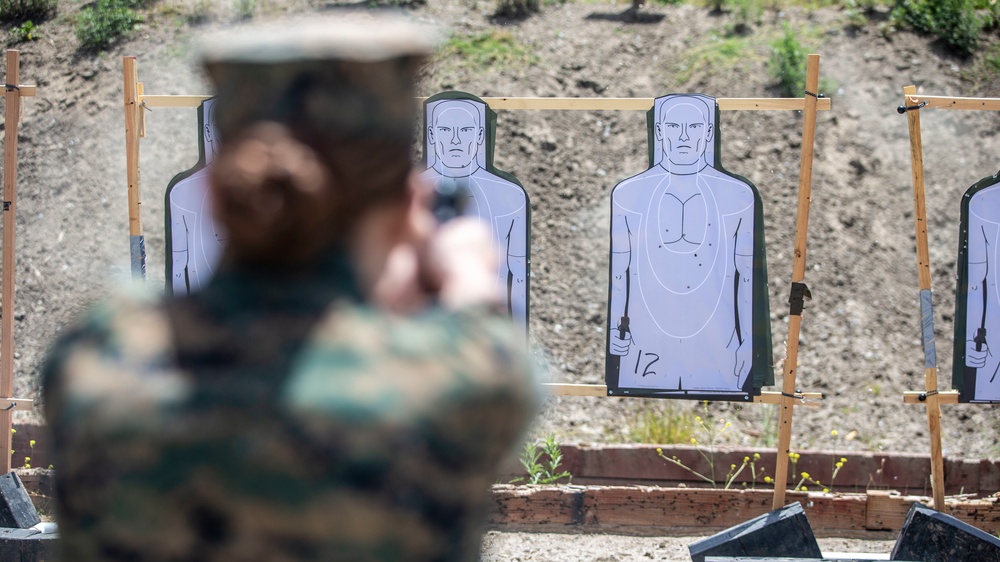 PMO trains new security augment force Marines in pistol marksmanship