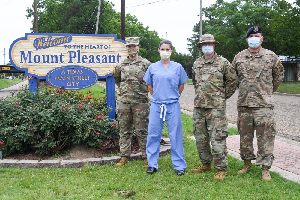 Members of the Texas Air and Army National Guard set up to administer COVID-19 tests at a meat packing plant in Mount Pleasant, Texas, on May, 20, 2020