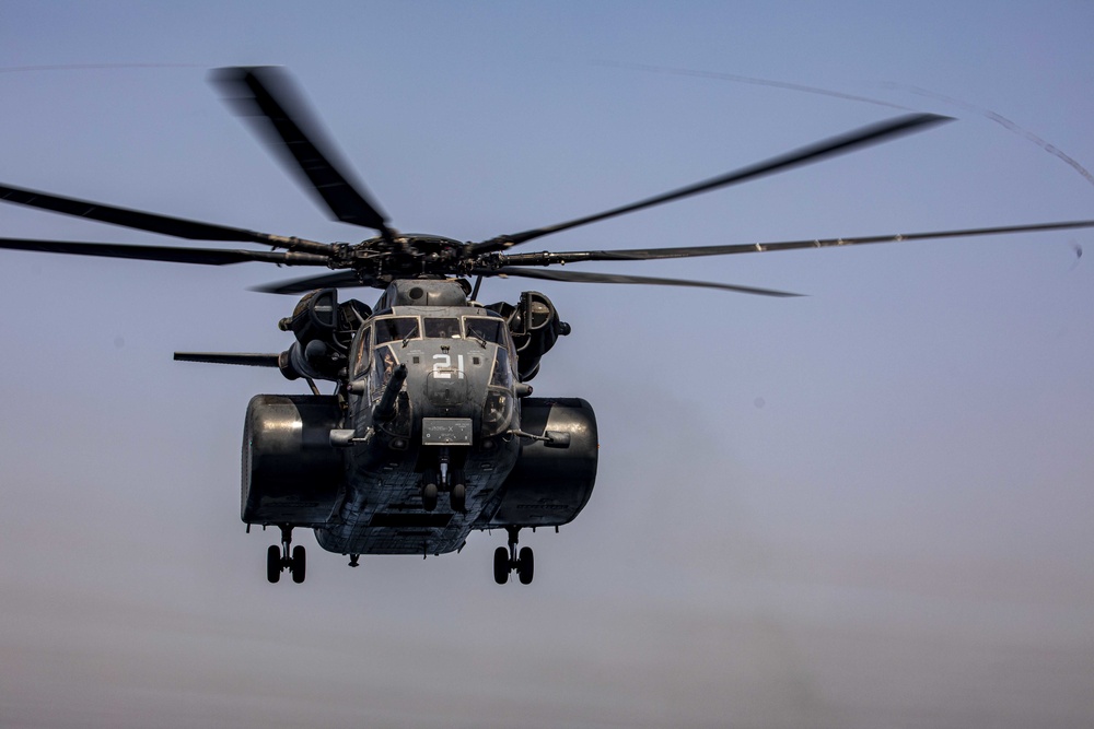 Sailors take part in flight operations.