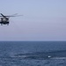 Sailors take part in flight operations.