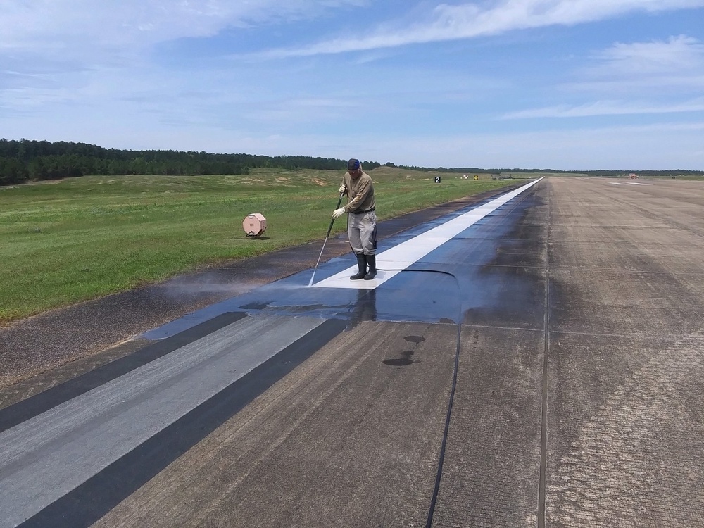 PWD Meridian stays within the lines, pressure washing the runway