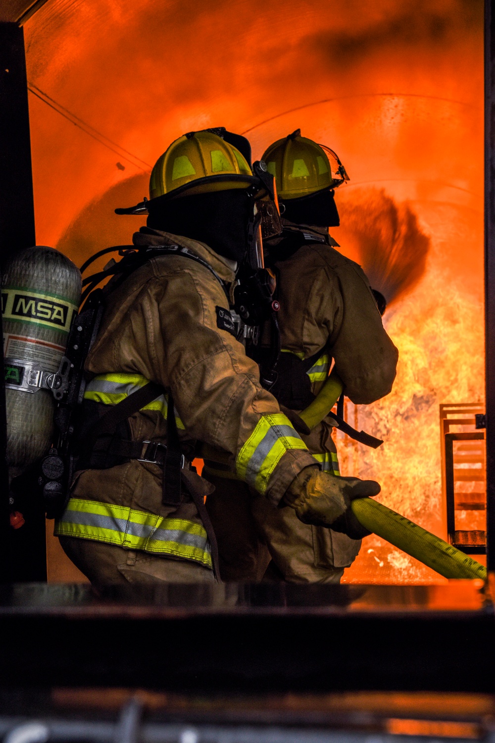 180FW Firefighter Train With Live Fires