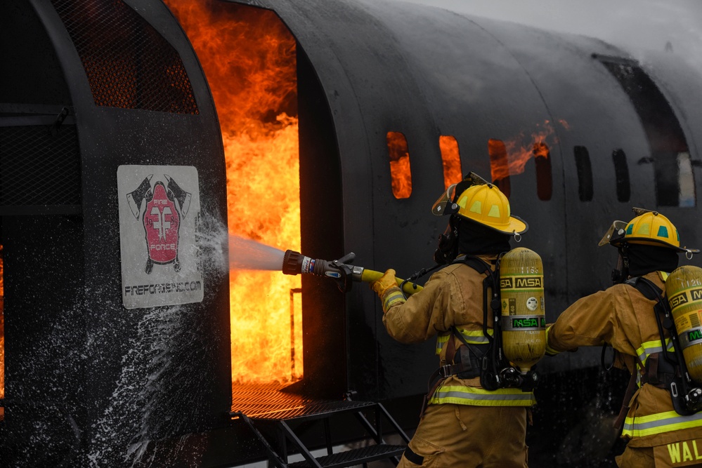 180FW Firefighter Train With Live Fires