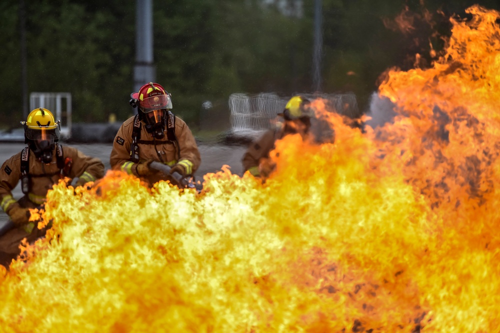 180FW Firefighter Train With Live Fires