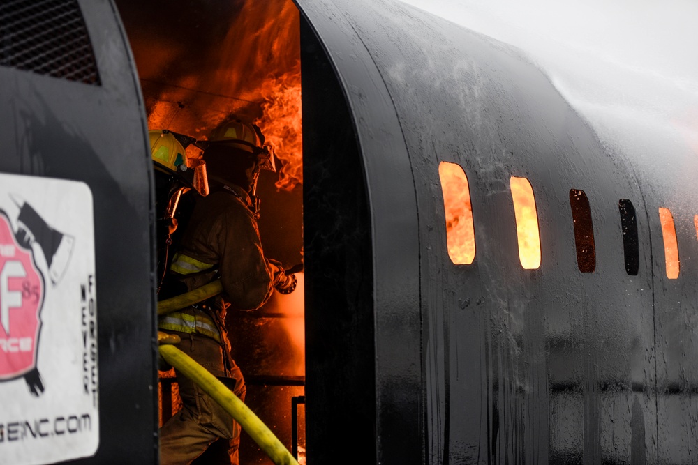 180FW Firefighter Train With Live Fires