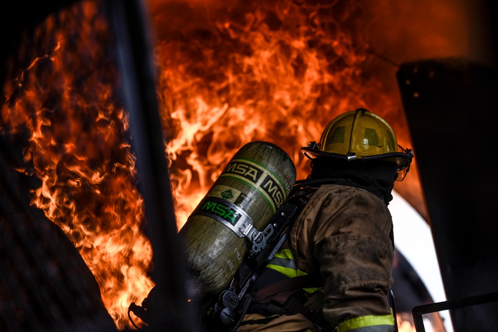 180FW Firefighter Train With Live Fires