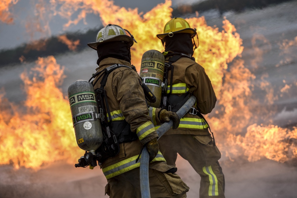 180FW Firefighter Train With Live Fires