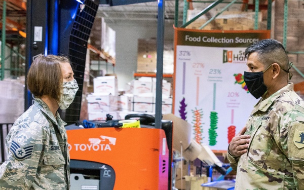 Missouri state leadership visit Airmen at local food bank
