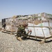 Coalition forces divest uniforms and concertina wire to Peshmerga forces