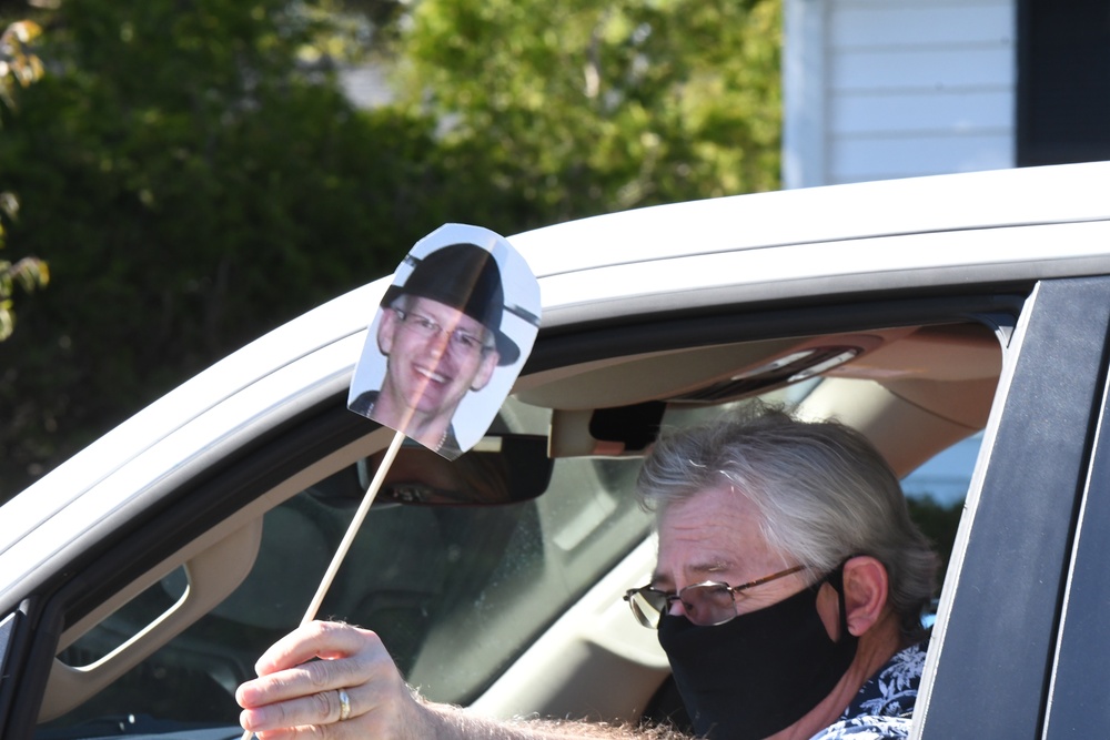Fort Drum NEC members surprise colleague with drive-by retirement parade