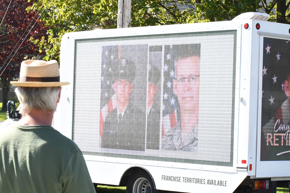 Fort Drum NEC members surprise colleague with drive-by retirement parade