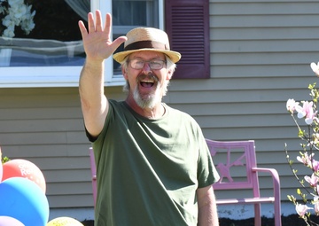 Fort Drum NEC members surprise colleague with drive-by retirement parade