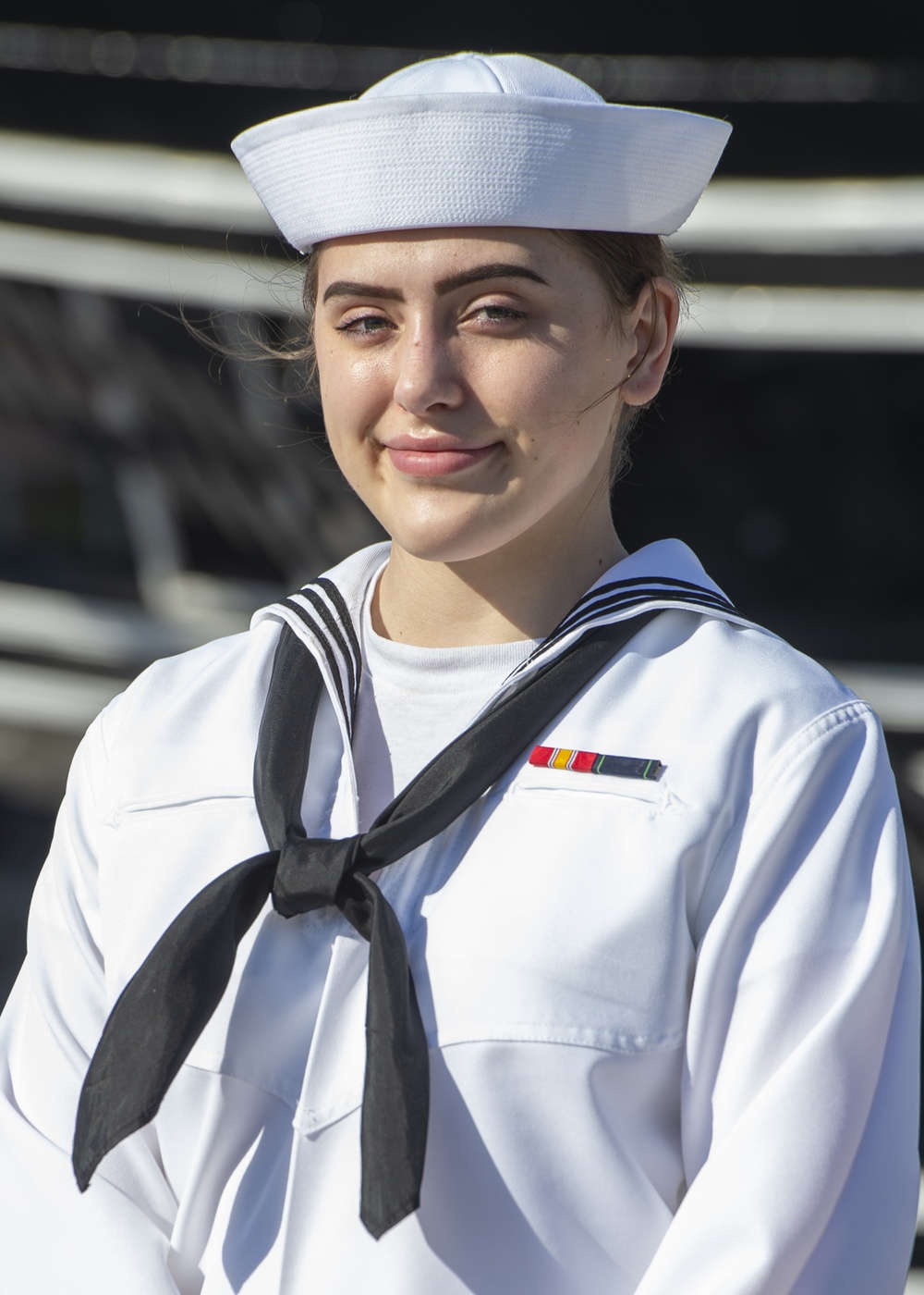 Airman Recruit Autumn Mackey, Poses for a Photo in front of USS Constitution.