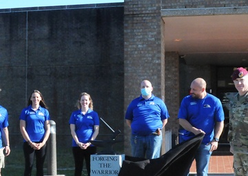 Wheelock Fitness Center employees unveil anvil