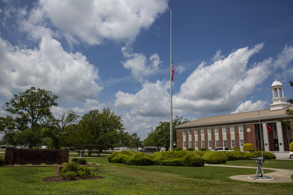 National ensign raised half-mast