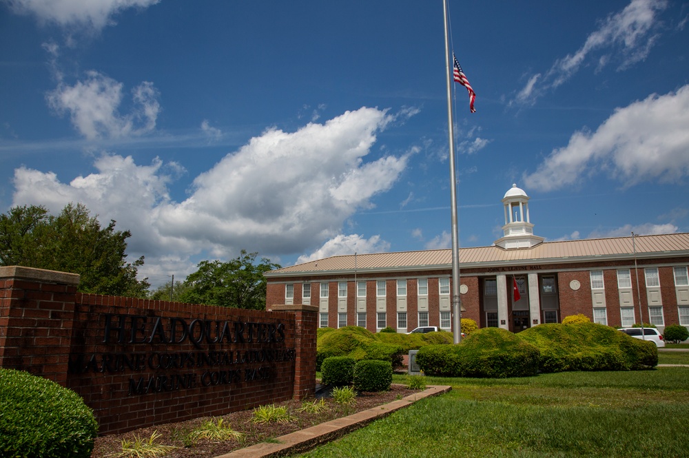 National ensign raised half-mast