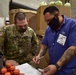Soldiers with forklift certification aid FIND Food Bank warehouse mission